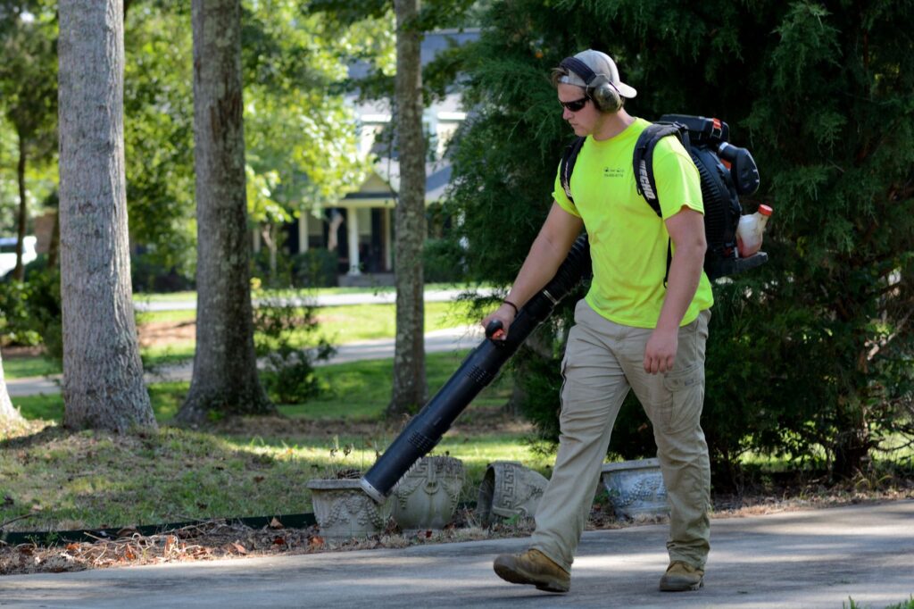 crew performing lawn care services marion oaks residential yard