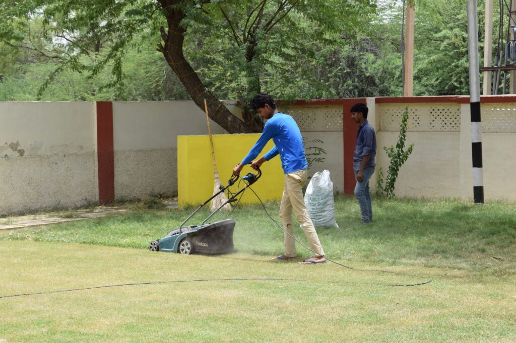 Who Really Offers Affordable Lawn Mowing in Ocala, FL? 1 lawn mowing crew servicing a residential yard in Ocala, FL